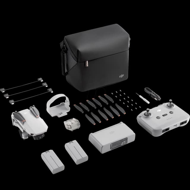 DJI Mini SE Fly More Combo - Camera Drone with 3-Axis Gimbal, 2.7K Camera, GPS, 30-min Flight Time, Reduced Weight, Less Than 0.249 Gram Mini Drone Image